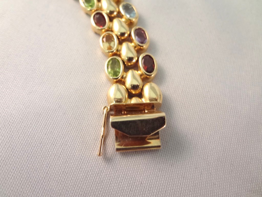 Lot Detail - 14K Gold Tennis Bracelet Multi Stone (40) Garnet, Citrine
