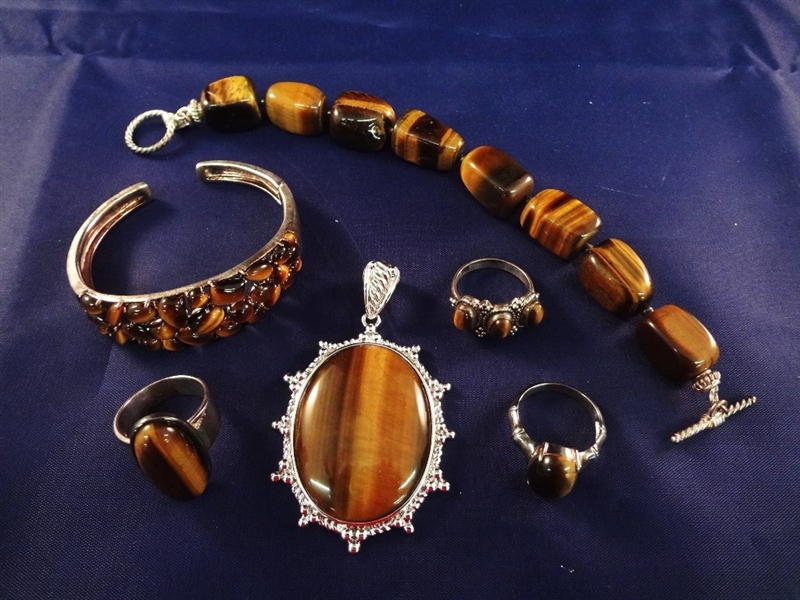Sterling Silver and Tiger Eye Jewelry Group: (3) Rings, Pendant, (2) Bracelets