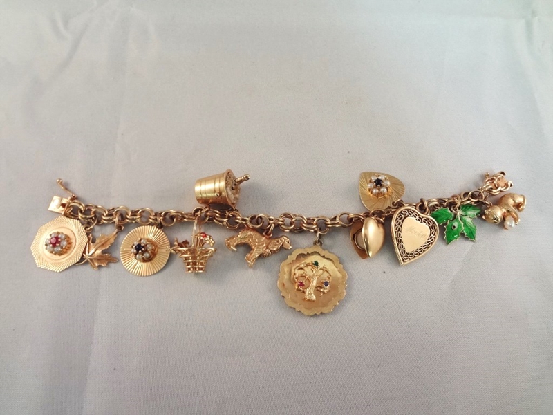 14k Gold Charm Bracelet with 12 14k gold charms