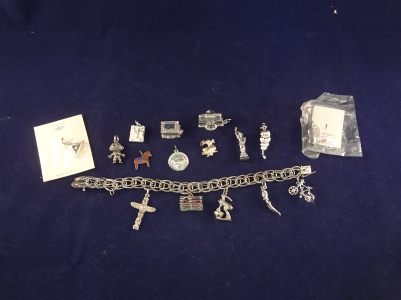 Sterling Silver Charm Bracelet With 16 Charms