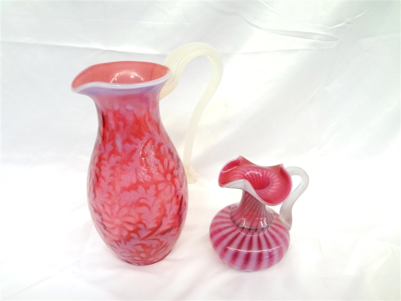 (2) Fenton Glass Cranberry Opalescent Pitchers: Herringbone and Swirl