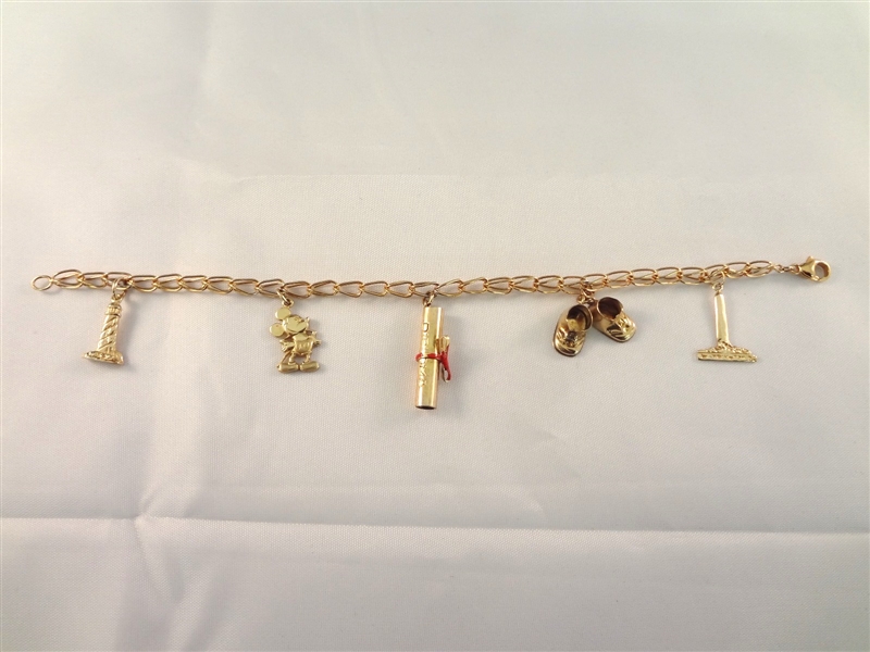 (6) 14k Gold Charms on Gold Plated Sterling Silver Bracelet