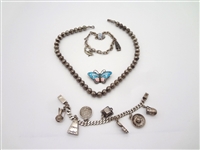 Group of Sterling Silver Jewelry: Brooch, Necklace and Bracelet