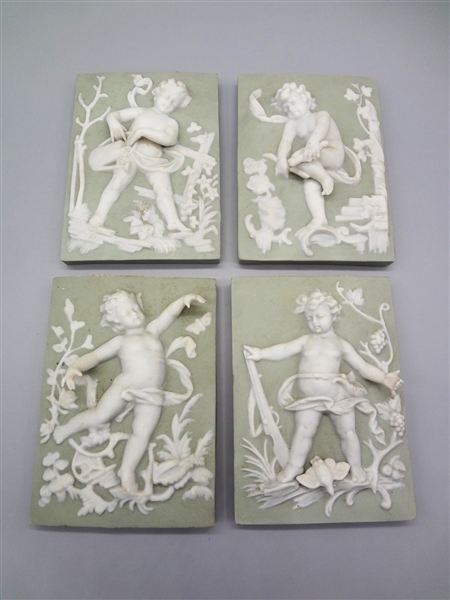 Set of Four Porcelain Putti "Four Seasons" Tiles
