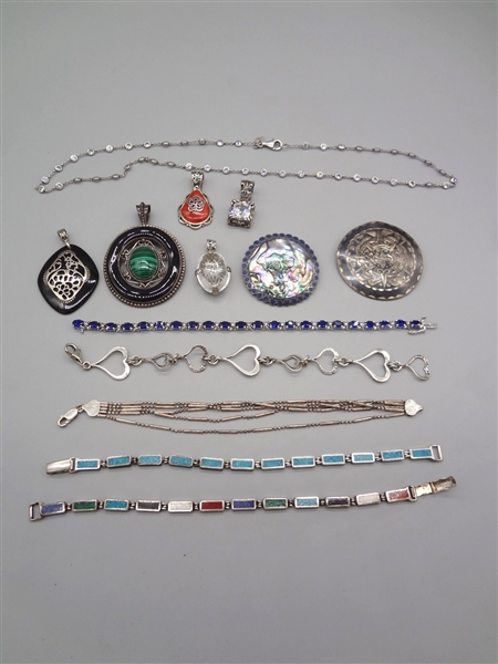 Group of Sterling Silver Jewelry: Bracelets, Brooches, Pendants, Necklaces