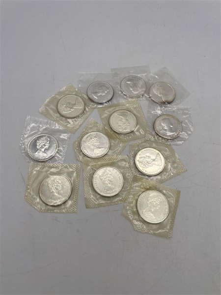 (12) 1965 Canada 50 Cent Silver Cions in OGP Sealed Bags (#314)
