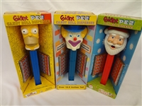 (3) PEZ Giant Pez Group:Homer Simpson, Clwon, and Musical Santa
