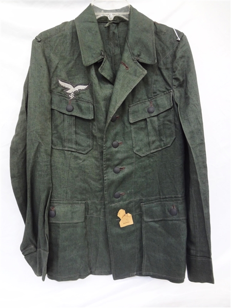 World War II German Luftwaffe Unissued Tunic with Insignia Patch and Paper Label