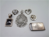Sterling Silver Jewelry Group: Belt Buckle, Pendant, Brooches