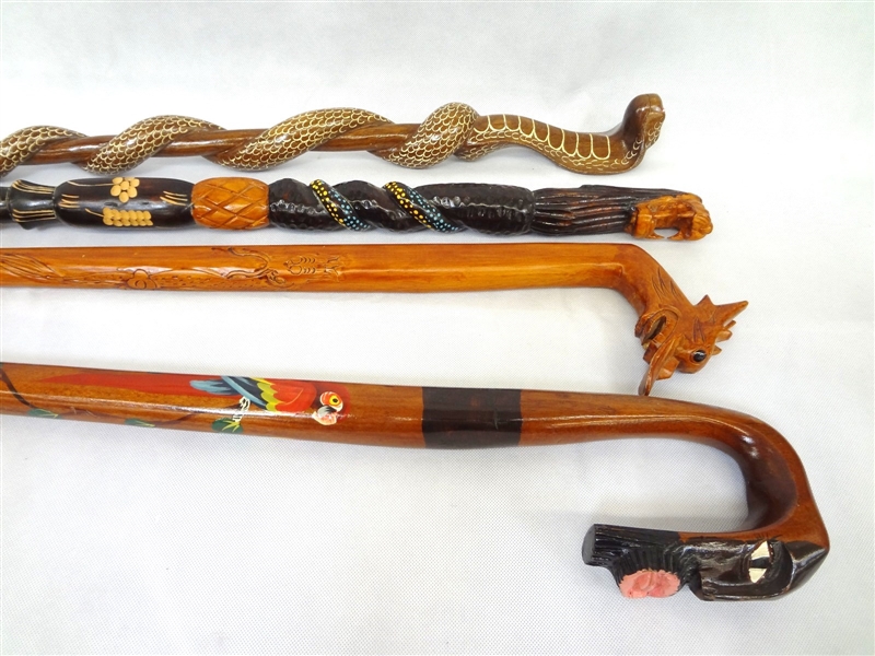 (4) Hand Carved Canes: Parrott, Dragon, Lion, Cobra