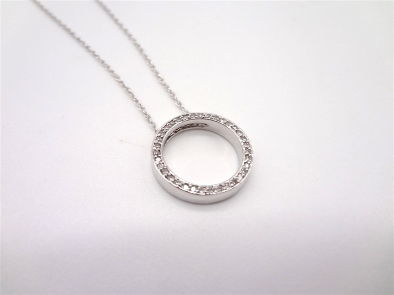 14k White Gold Necklace With Round Pendant and 35 Small Diamonds