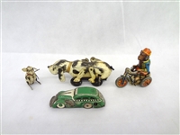 Group of Early Germany and Japan Tin Toys