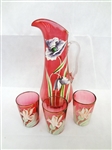 Hand Blown Cranberry Glass Pitcher Enamel Flowers and (3) Tumblers