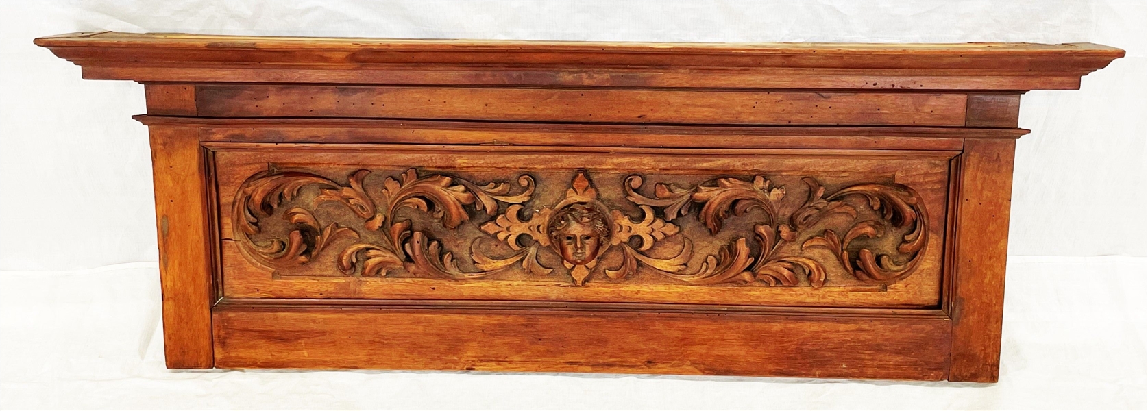 Carved Architecural Wood Panel High Relief Scrolls and Child Bust Center