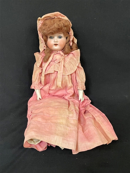 German Porcelain Head Doll Cloth Body.