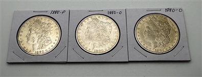(1) 1880-P and (2) 1880-O Morgan Silver Dollars
