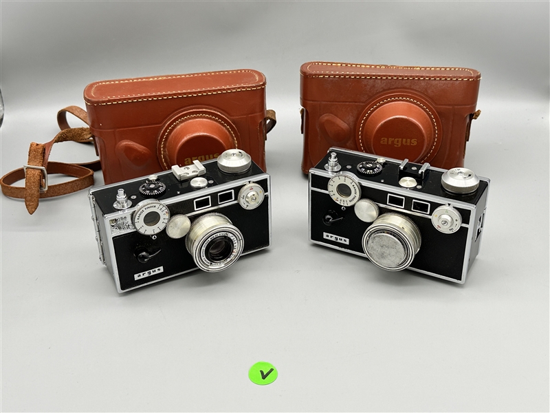 (V) (2) Argus C3 Rangefinder Cameras with Leather Cases