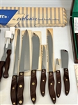 Group of Cutco Cutlery With Sleeves and Hangers