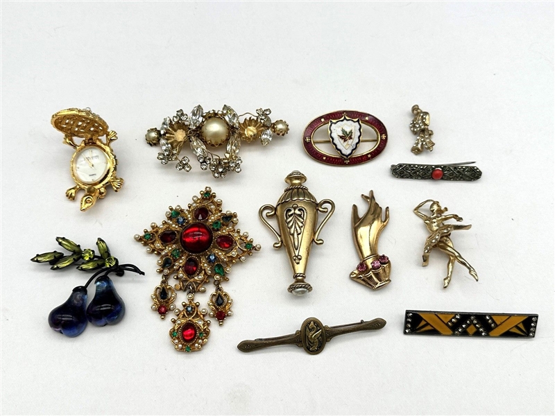 (12) Group of Costume Brooches; Hattie Carnegie, Others