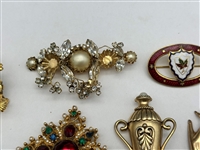 (12) Group of Costume Brooches; Hattie Carnegie, Others