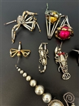 Group of Inset Glass Ornaments and Figural Segmented Insect Ornaments
