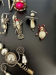 Group of Inset Glass Ornaments and Figural Segmented Insect Ornaments