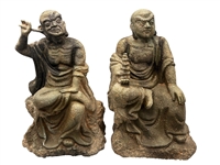 Pair of Lohan Faux Stone Carved Figures