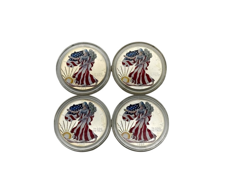 Group of (4) 1999 $1 Colorized Silver American Eagles
