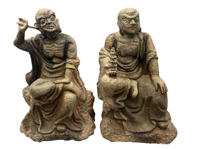 Pair of Lohan Faux Stone Carved Figures