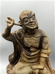Pair of Lohan Faux Stone Carved Figures