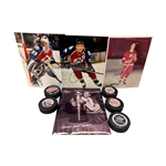 Group of Signed Hockey Color Photos and Hockey Pucks Including (2) Gordie Howe