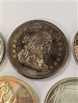 (5) One Ounce .999 Silver Rounds, (2) 1/2 Ounce Silver Rounds
