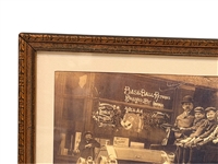 Black and White Photograph TOC Baseball Returns showing in Window